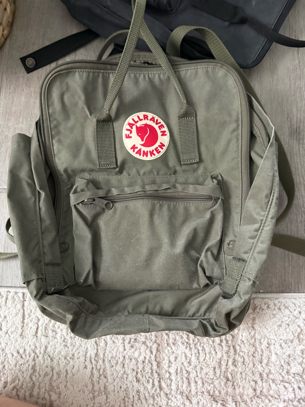 Fjallraven Kanken Backpack in Olive Green with Red Logo